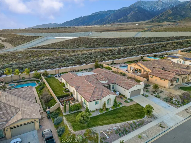 Bird's eye view of the front yard, foothills and horse trails.