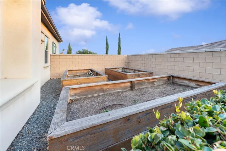 Raised Garden Beds at side of property.
