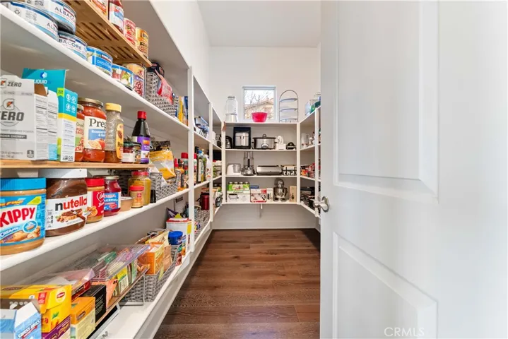 Oversized pantry that can accommodate all the kitchen mini appliances and canned/packaged food items you need.