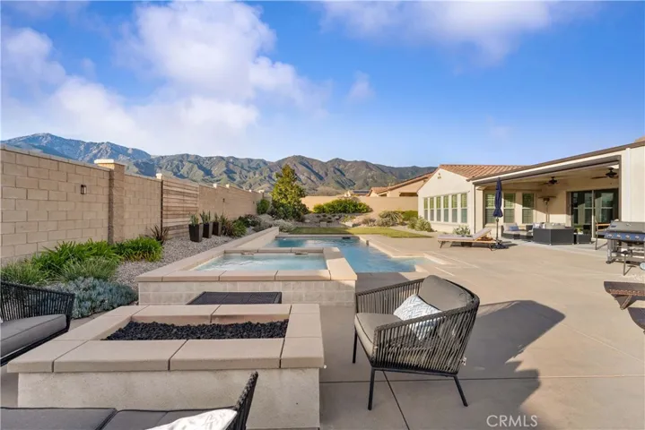 So much to enjoy: fire pit, hot tub, pool, outdoor living, bathing in the sun, foothill views...