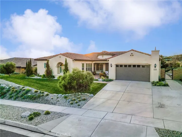 Gorgeous luxury estate with 3 car tandem garage and spacious courtyard.