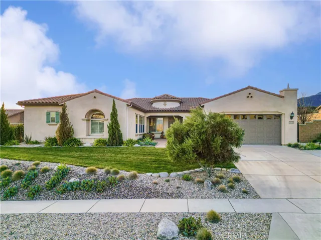 Gorgeous luxury estate with 3 car tandem garage and spacious courtyard.