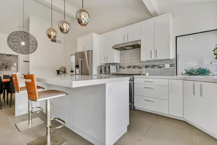 #11 Quartz counters & Designer Tile Back