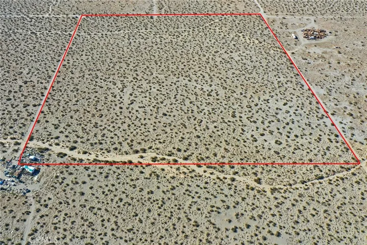 Red property boundary markers are not to be relied on as exact property lines. Buyer to confirm independently.