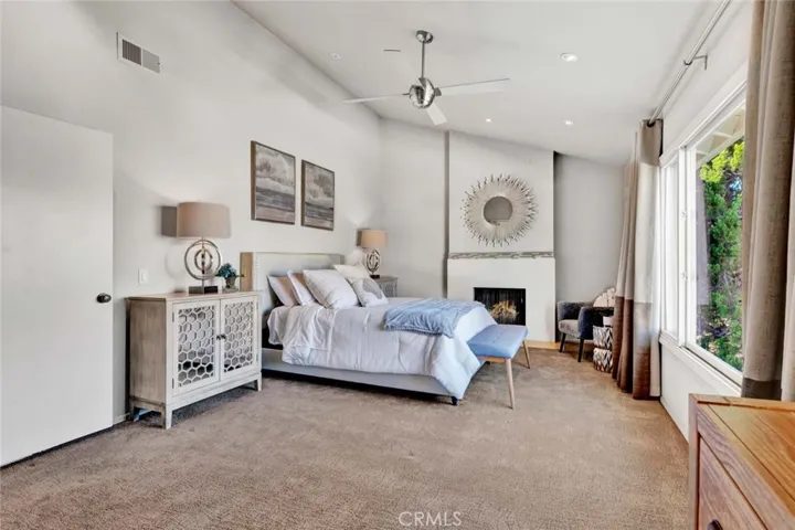 Luxurious Primary Suite with Sitting Area and fireplace
