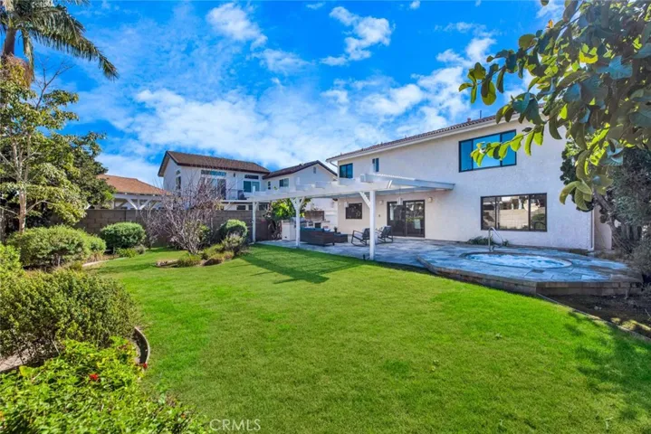Park-Like Backyard with Covered Patio, BBQ Center, and Spa