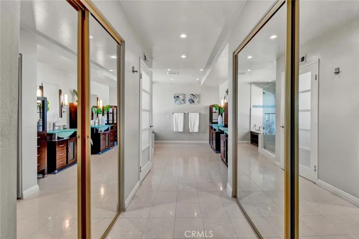 Dual Mirrored Closets - 1 is a Walk-In