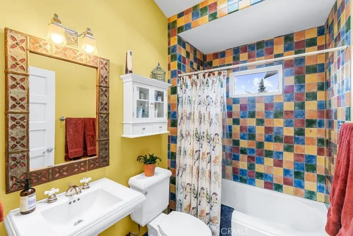 Delightful tiled second bathroom