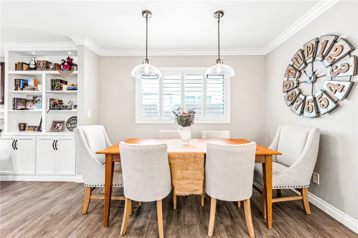 Dining area, light and bright. Layout is perfect for entertaining and hosting family dinners and celebrations!