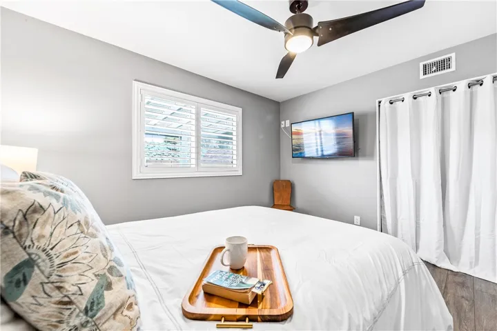 Another view of bedroom 2 with closet and lovely natural light streaming in.