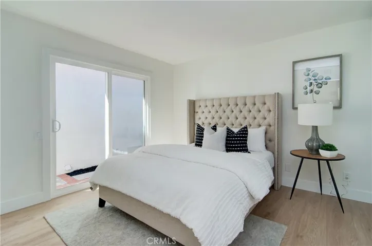 Secondary bedroom with private patio.