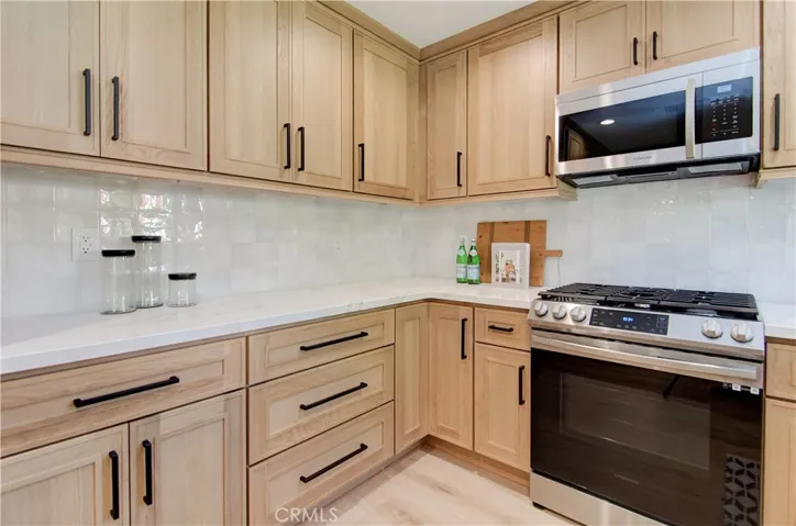 Designer, soft close white oak cabinets