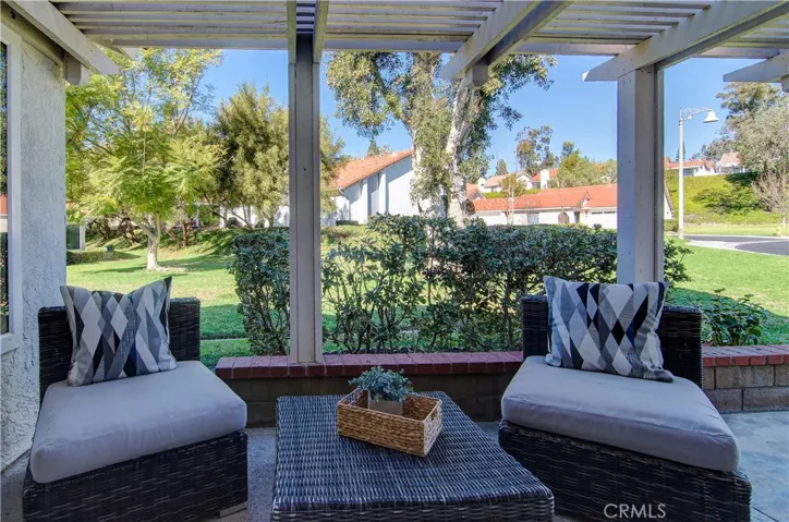 Sunny quiet private patio off living room.