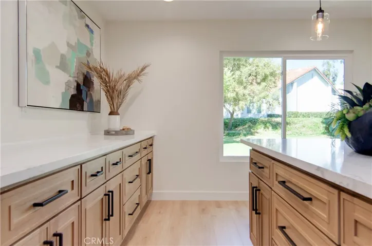 Light and bright corner unit with views of green belt.