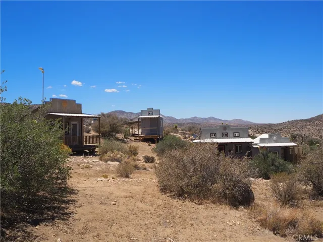 Casita on the left, workshop in the middle, main house on the right. Looking towards the west.