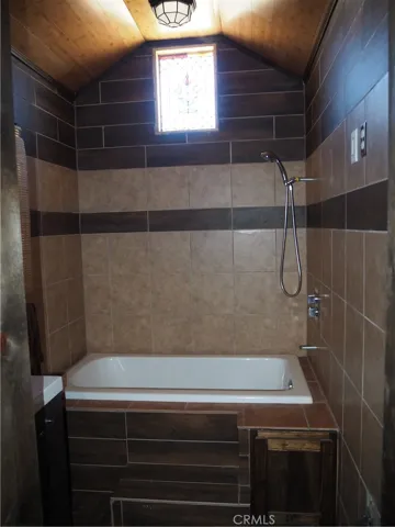 Soaker tub and shower in the full bath.