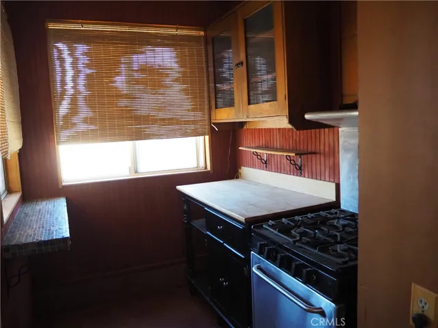 Other side of the kitchen area propane stove.
