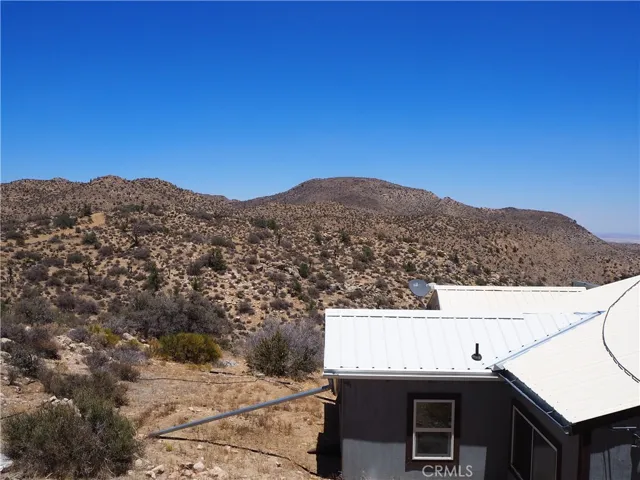 Main cabin metal roof with gutters, very durable system.