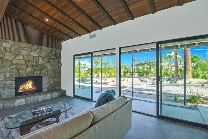 LIVING ROOM OUT TO FRONT PATIO.jpg mls