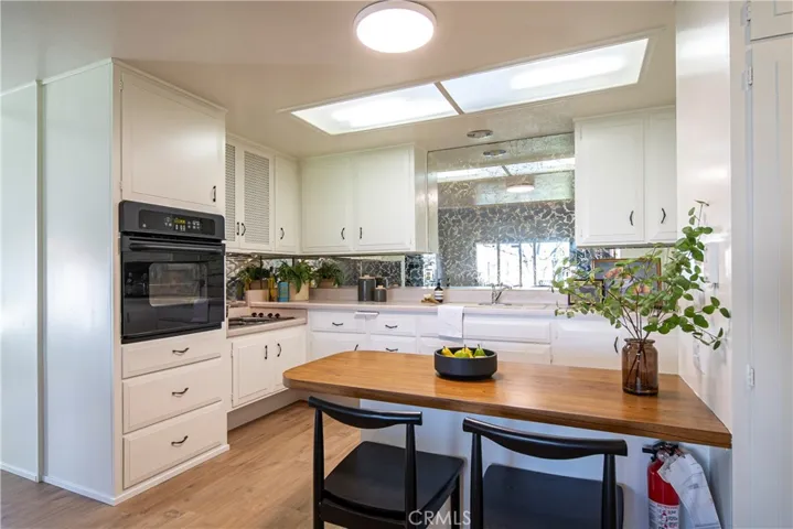 Adorable kitchen with dining island