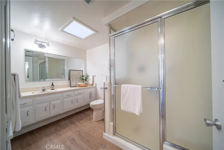Bathroom with cutdown shower