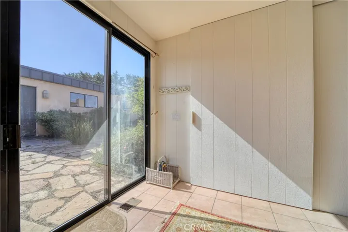 Sun Room w laundry in closet