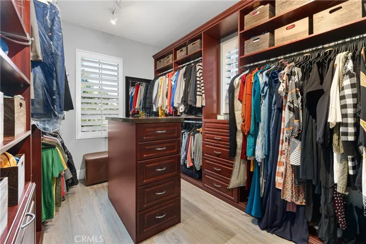 Owner's suite has large walk-in closet with built-ins.