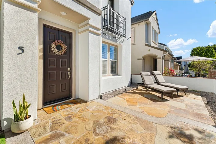 Corner lot home freshly painted with built-in year around festive lights, cul-du-sac location, paid solar, upgraded front and backyard suited for entertainers dream!