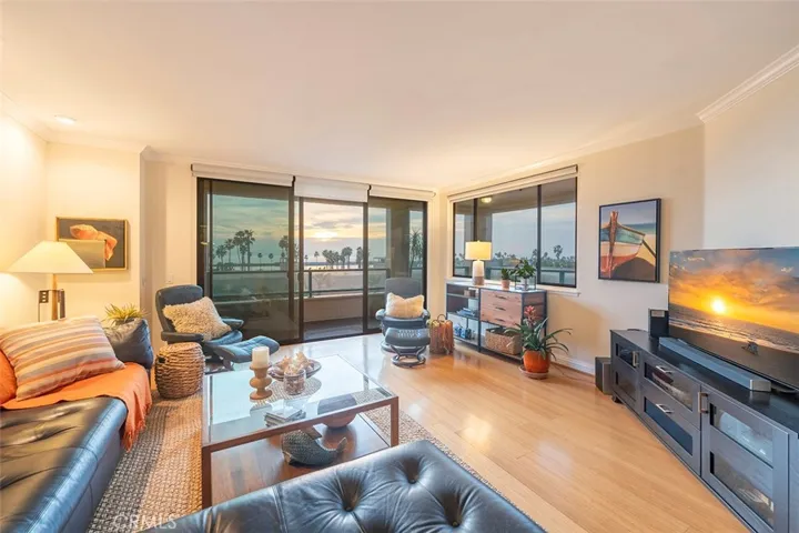 Spacious living room with gorgeous bamboo flooring with direct access to wraparound deck and Ocean View