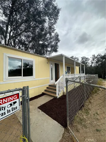 Entry from left side of property