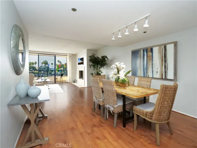 Dining and Living Area with Laminate Flooring