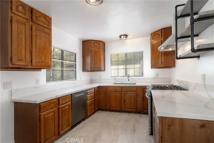 New Quartz floors & counters, new sink & dishwasher