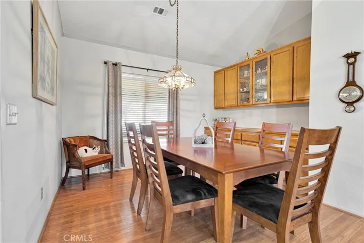 Formal dining area with custom built-in cabinets.
