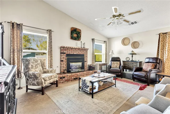 Family-room with cozy fireplace.
