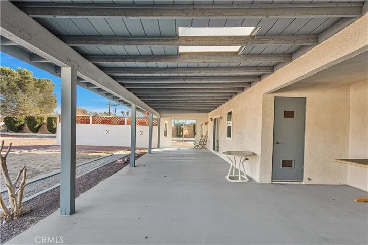 Shade back patio with skylights.