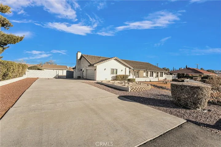 Side entrance garage, Plus additional detached garage.