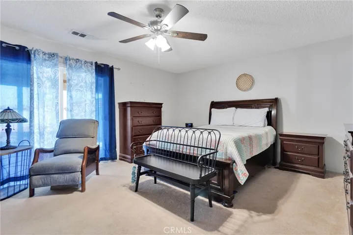 Main bedroom with private exit to back patio.