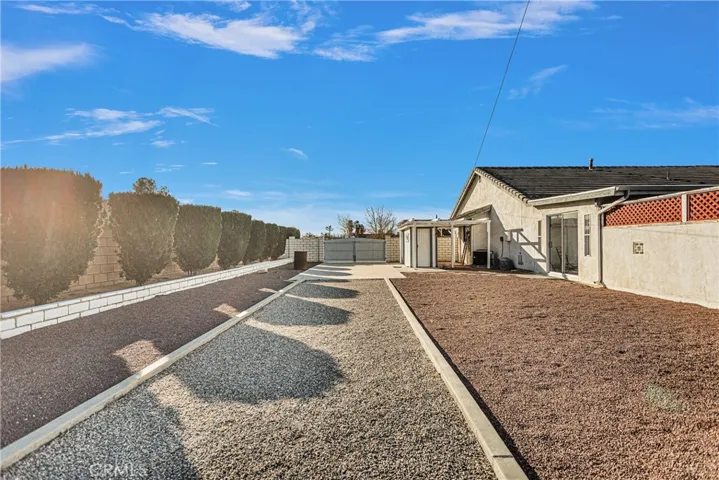 Second driveway perfect for RV parking.