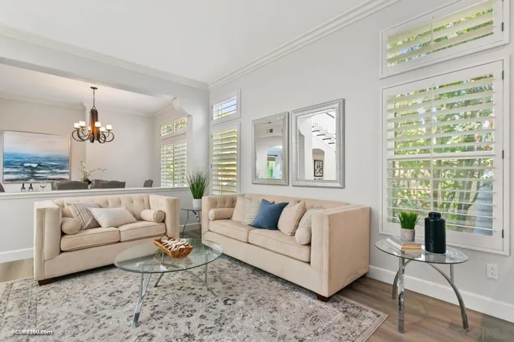 Amazingly spacious formal living room with a view to the formal dining area