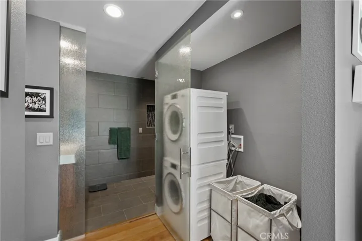 This beautiful Custom Rain Glass Obscured Door opens to Bathroom.