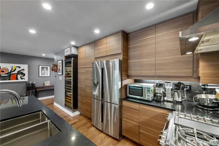 This Chef inspired Kitchen has it ALL...Stainless Steel high-end appliances, Beautiful Cabinetry, and Recessed Lighting!