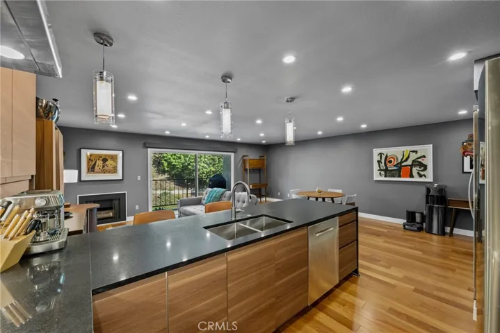 The open concept Living Room, Dining Room, and Kitchen are spacious and very well-appointed!