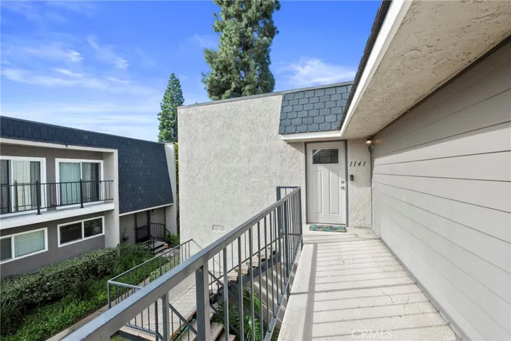1141 Rosecrans Avenue #33A is an upstairs unit located at the back of the complex.