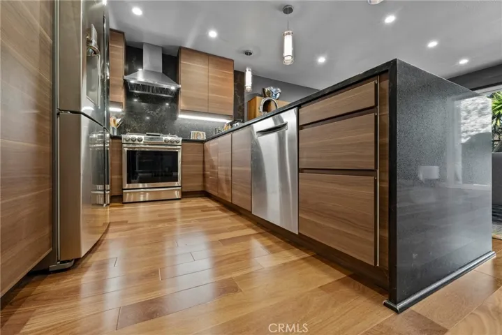 Beautiful Brazilian Teak Hardwood Flooring throughout the unit!