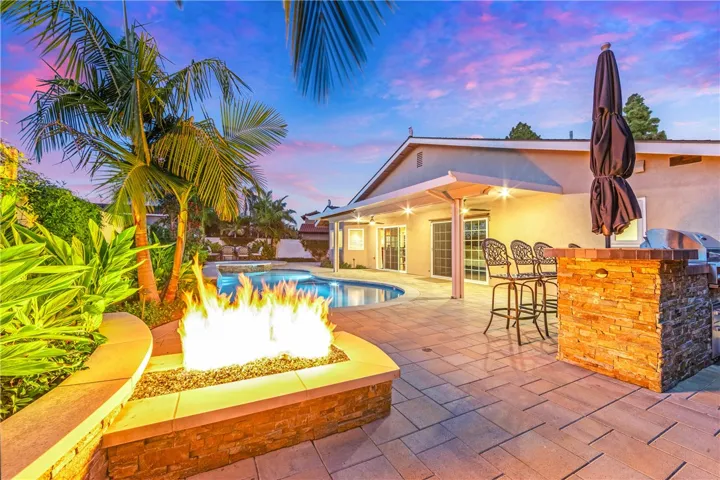 Twilight pictures of the firepit and backyard