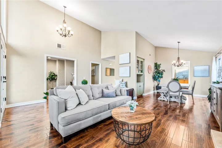 Living room with view of dining room