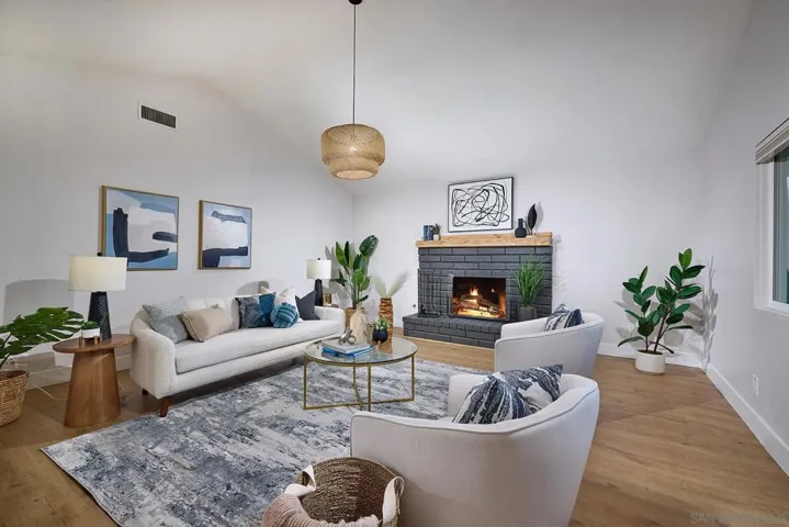 Oversized light & bright Living Room with cozy fireplace