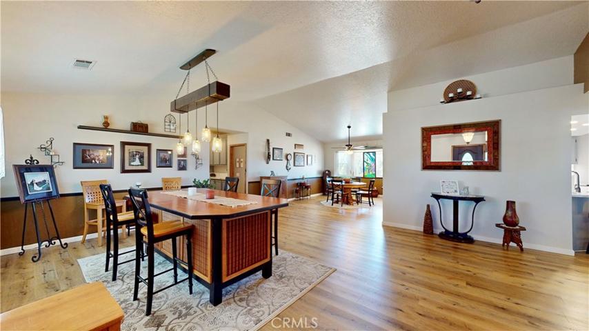 giant living room. currently used for holiday dining. Hand crafted chandelier included.