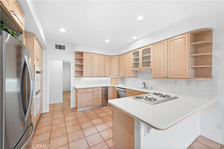 Solid maple kitchen cabinetry in the kitchen
