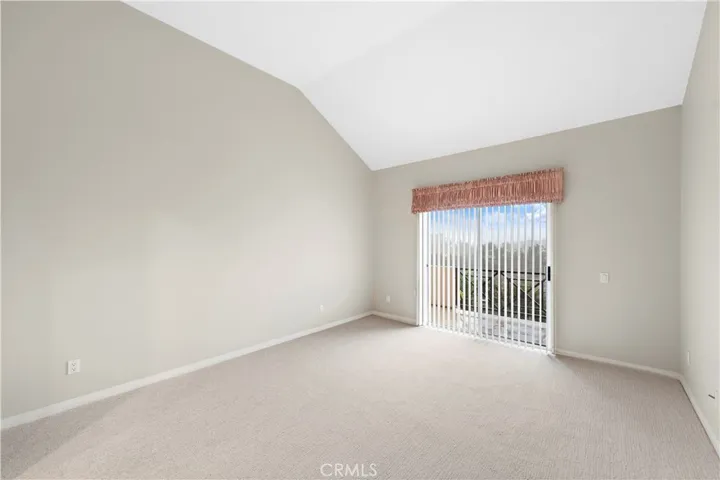 The primary bedroom has tall ceilings and a balcony large enough for a bistro table and chairs or lounge to enjoy the views.